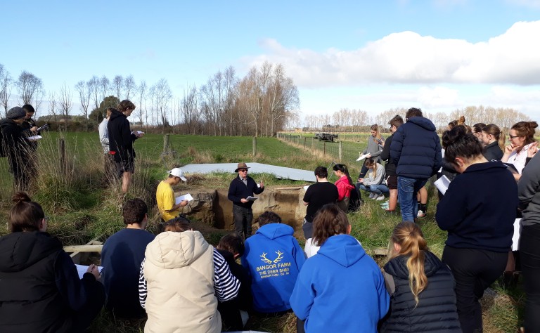 Roger talking to class