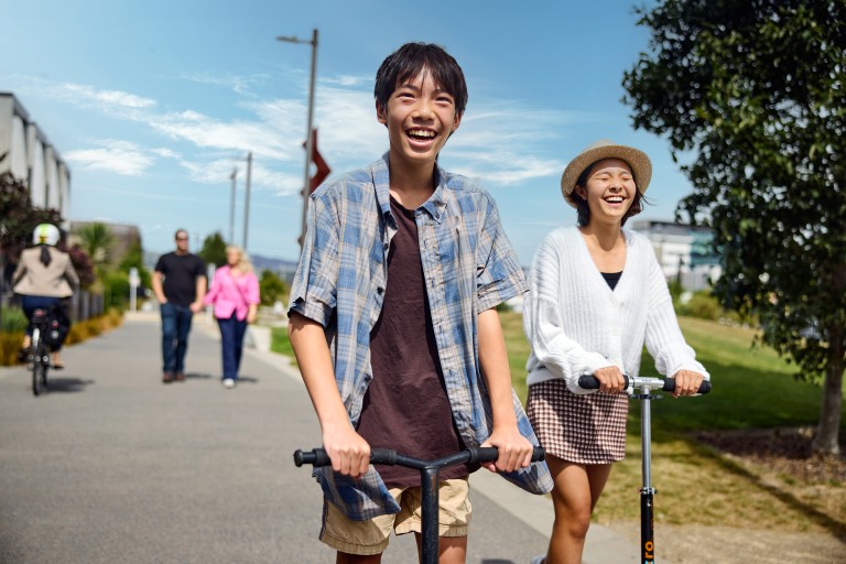 551323 teenagers on scooters at rauora park